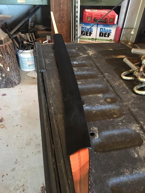 https://www.autohaulersupply.com/images/content/how_to_put_a_sleeve_on_a_lasso_strap.jpg