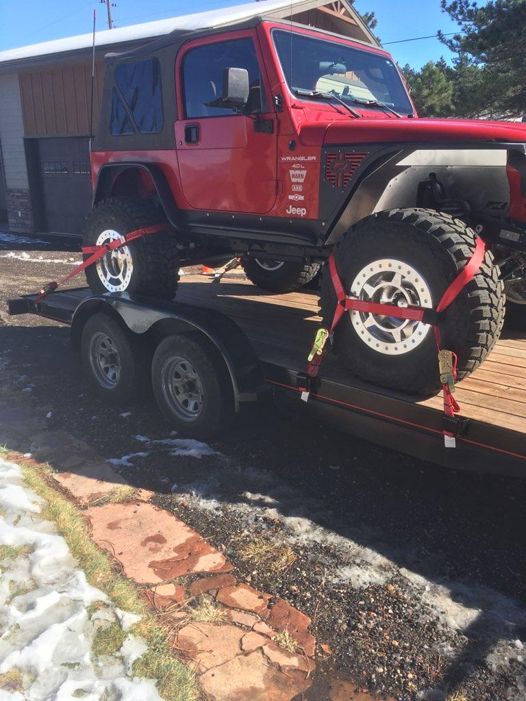 large_555066_doubleratchetjeeptirestrap.jpg